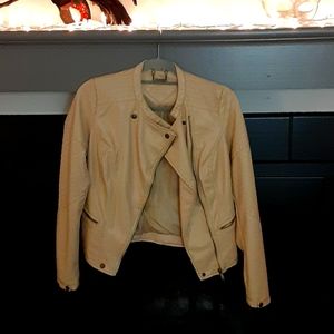 Tan faux leather jacket.